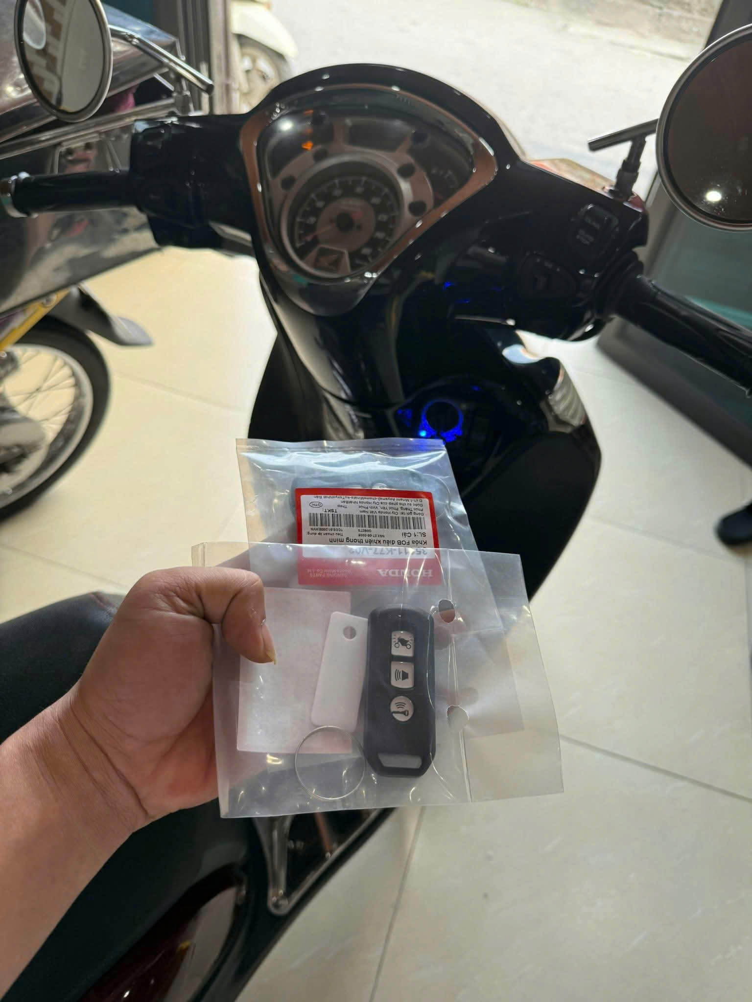 làm lại chìa khóa xe sh mode bị mất chìa khóa