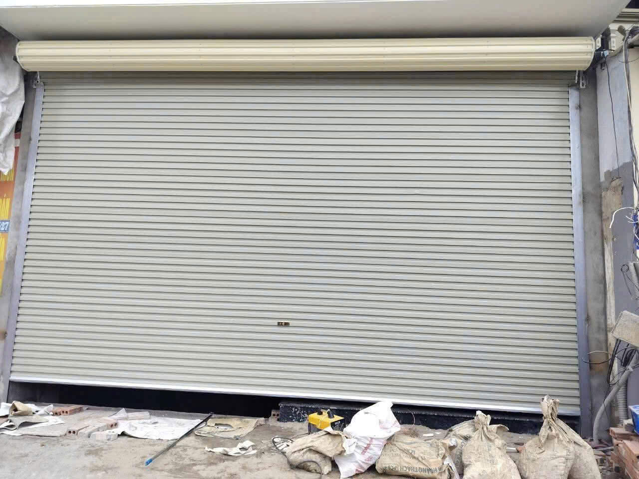 Hình ảnh báo giá sửa cửa cuốn gần đây rõ ràng, không phát sinh chi phí, cam kết bảo hành sau sửa chữa.